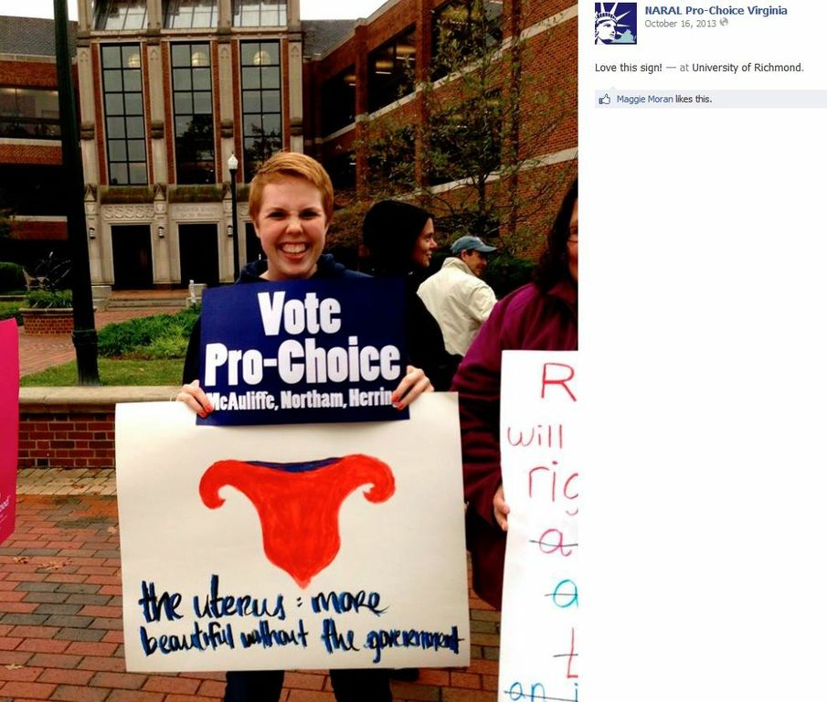 NARAL Pro-Choice Virginia posted a photo of a female holding a sign that says: Vote Pro-Choice, The uterus more beautiful without the government. It has a drawing of a uterus above the words