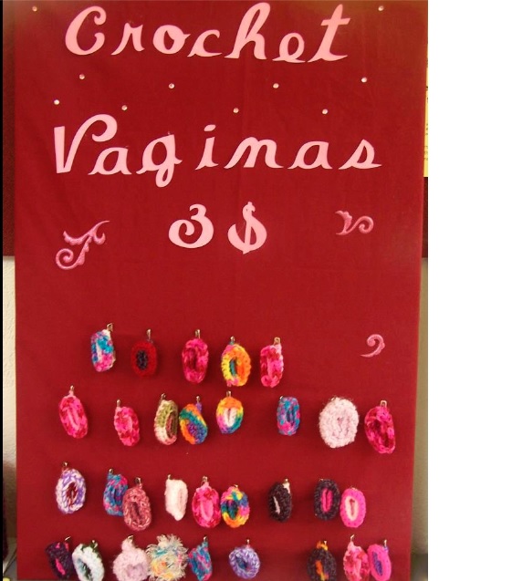 A photo of a red board with crochet vaginas that you can purchase for $3