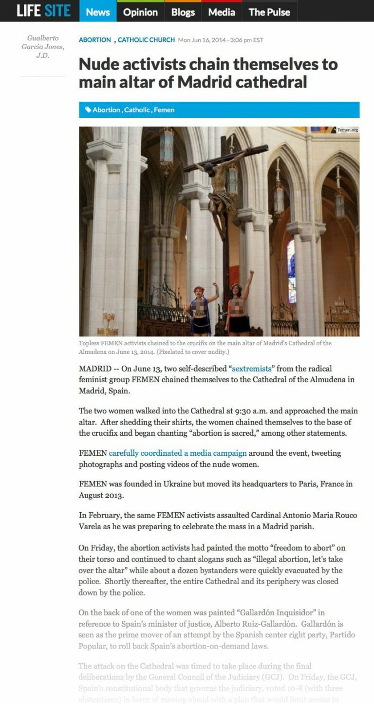 Nude activists chain themselves to main altar of Madrid cathedral