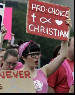 A photo of a female abortion supporter who claims on her sign that she's: Pro-Choice and Christian