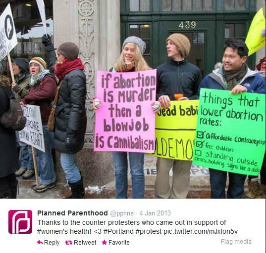 Planned Parenthoods tweeted a picture of some counter protesters who had signs that said: If abortion is murder, then a b**wj** is cannibalism