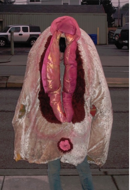 A photo from Planned Parenthood of columbia willamette of a male dressed in a vagina costume