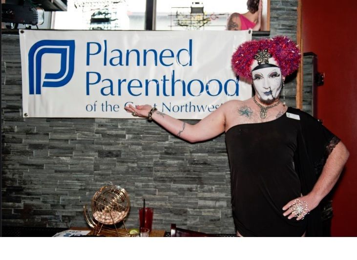 A photo from Planned Parenthood of the Great Northwest of a man dressed up as a drag queen at one of their fundraisers
