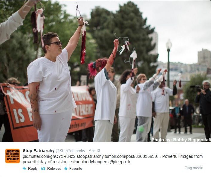 Stop Patriarchy posted on their twitter a picture of their rally to demonstrate resistance so that our country wont go back to the times of bloody coat hangers. There is a bunch of women in white T-Shirts with blood on them and each is holding up bloody coat hangers