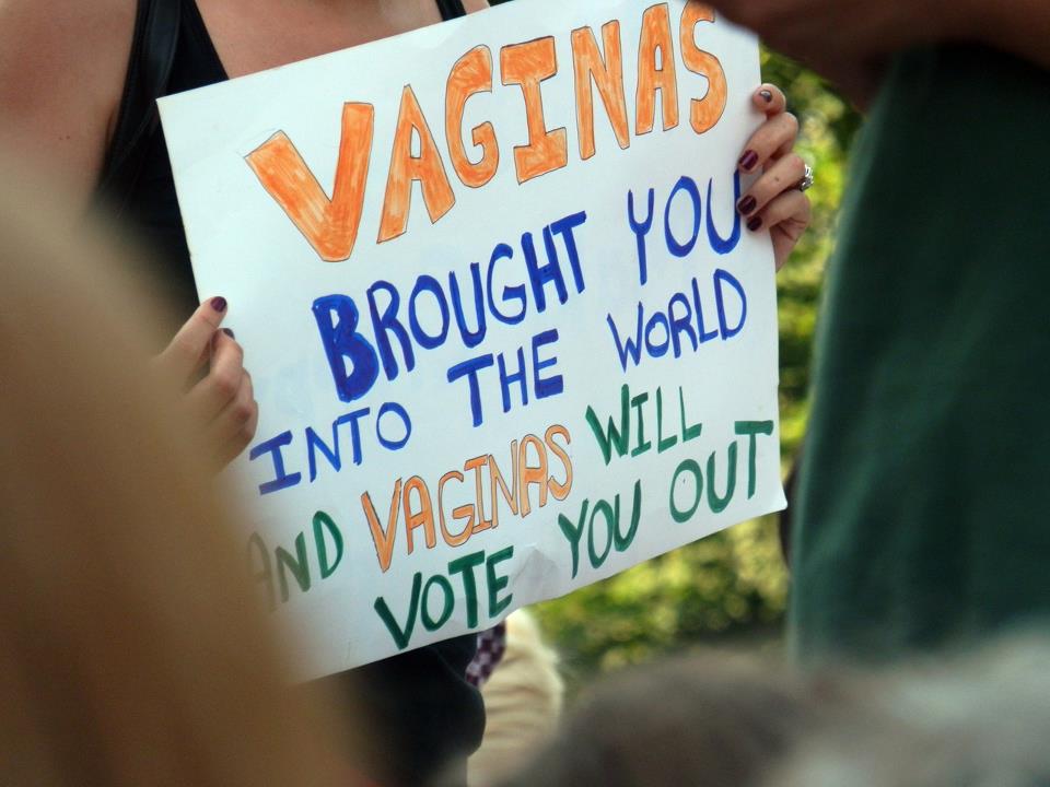 A protest sign that reads: Vaginas Brought You Into The World And Vaginas Will Vote You Out