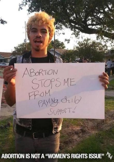 A picture of a male holding a sign that says: Abortion Stops Me From Paying Child Support!