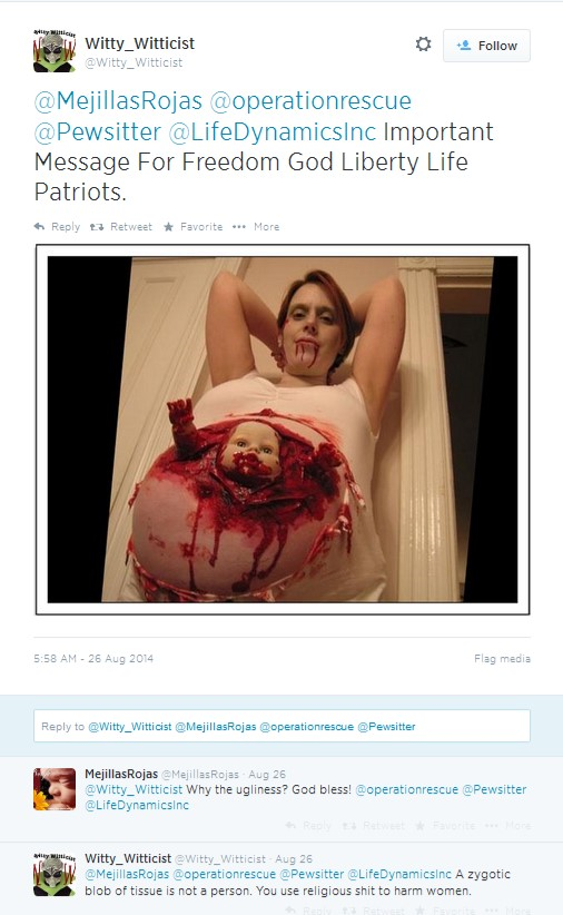 Someone tweeted at Life Dynamics a photo of a pregnant women with fake blood dripping out of her mouth and she has a fake baby head and arm sticking out of her stomach which is also covered in blood.